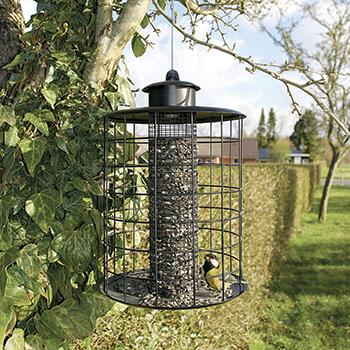 Foderautomat med værn til nødder og solsikker