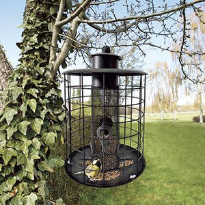 Foderautomat med værn til frøblanding